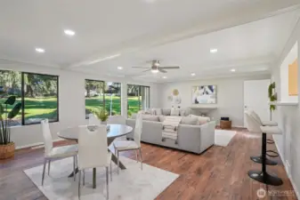 Expansive family room with half bath and access to back deck