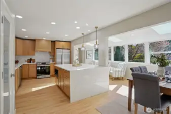 Remodeled kitchen with modern island/breakfast bar