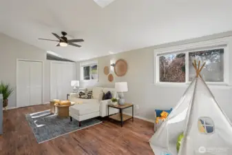 Light filled upstairs bonus room could be used as an office or bedroom