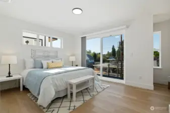 Relish the spacious primary bedroom with a balcony.