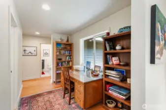 Down the hall to the bedrooms.  Office to the right, laundry to the left door that you can just see against the wall.