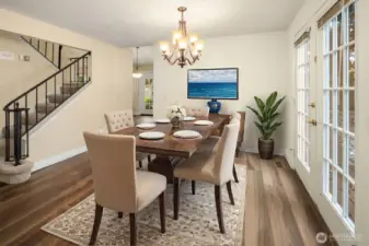 Dining room is just steps from the kitchen and has enough room to expand your table for holiday dinners. (Digitally staged).