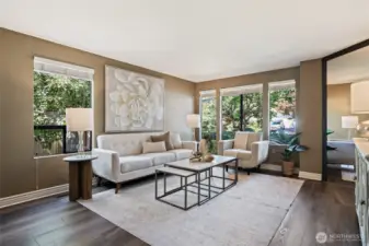 You'll love these walls of windows and the beautiful views of the mature landscaping outside.