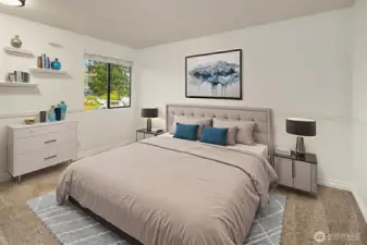 Another upstairs bedroom with new lighting and closet with built-ins. (Digitally staged).