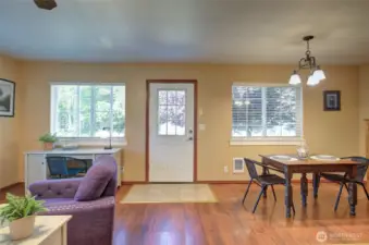 Coastal charm shines in this versatile, wall-free space.