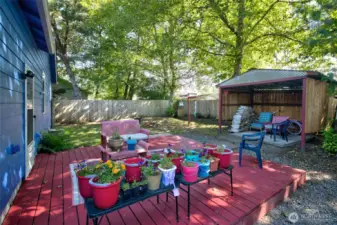 The inviting deck is the perfect spot for morning coffee or evening chats.