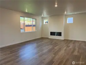 Living room area with electric fireplace