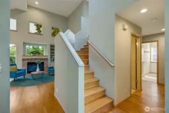 Three additional bedrooms, a full bathroom, and an open mezzanine area can be found upstairs.