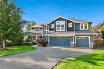 Situated on an incredible lot, just shy of an acre