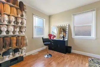 Main floor second bedroom used as a Hair Loss Consulting business