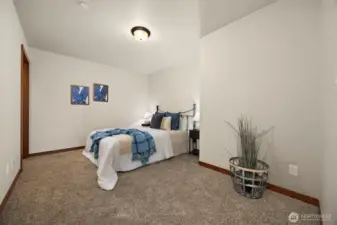 The second bedroom is spacious, and offers access to the second bathroom in the condo.