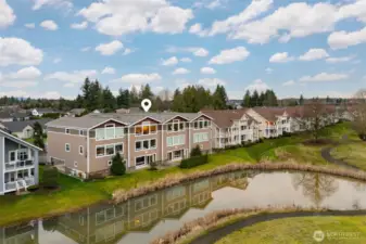 View of the your unit in the 8 unit complex. The first level is the shared community space & garages.