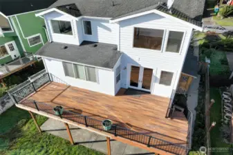 Views also from Primary suite and updated kitchen which nicely connect to the view deck