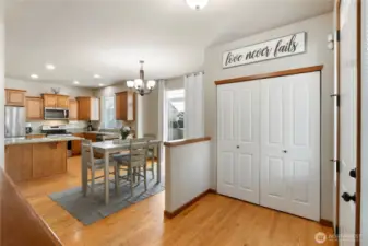From the front entrance opens into the open concept kitchen. Look left and see a welcoming Living room.