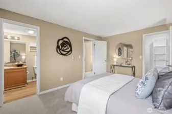 Comfortable primary bedroom with a walk-in closet and its own en-suite bath, offering added privacy and everyday convenience.