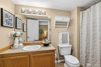 A private en-suite bath off the primary with a shower, making everyday routines easier and more comfortable.