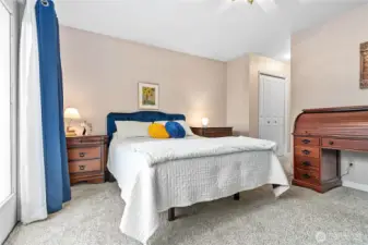 Private primary bedroom and ensuite look out to the creek and nature