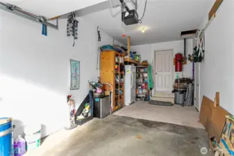 Garage is a two car garage that had a wall built to make half of it into a wood working shop.  Wall can be removed upon request.