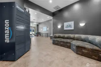 Wonderful secure lobby entrance with seating area and secure Amazon pickup/drop off containers and mail room