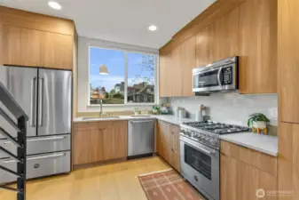 Kitchen is open to the dining and has windows to the west.