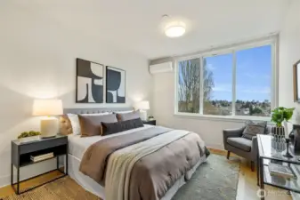 Primary bedroom with views.