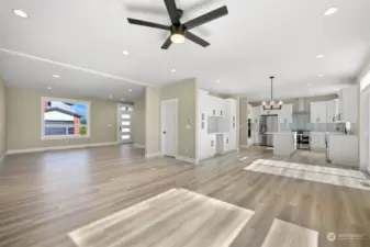 The living room flows into the dining and kitchen.  Luxury vinyl flooring throughout the main floor.