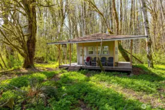 Cabin with front porch seating