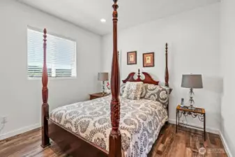 Bedroom 3 perfectly placed alongside the full bath on the guest wing. Engineered hardwood floors throughout this well-appointed home.