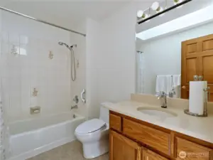 Upstair full bathroom with skylight.