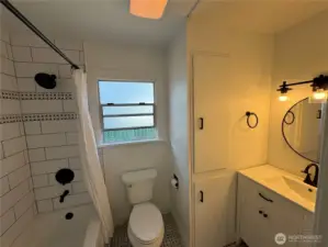 Main floor bath with tiled tub