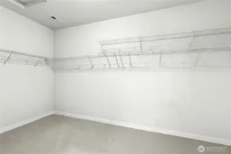 Large walk-in closet for the primary suite.