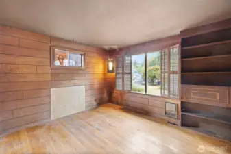 Primary bedroom with hardwood floors