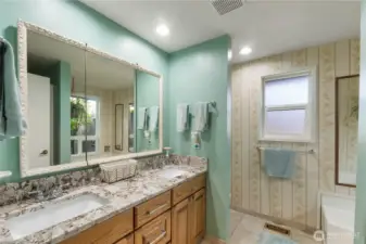 Remodeled primary bathroom has heated tile floors!