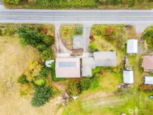 Overhead property layout view showing home, shop, and yard space.