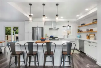 Remodeled kitchen in 2022 with wine fridge and apron sink