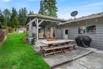 Covered patio and backyard