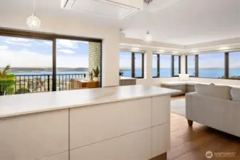 A View that Never Tires: Mountain to Sound by day, gorgeous sunsets and City lights by night.