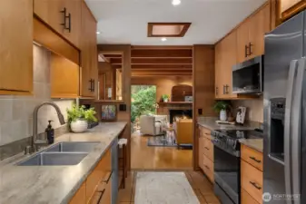 A fabulous updated kitchen with plenty of storage. Featuring a new WHIRLPOOL refrigerator, new GE PROFILE Range; New GE PROFILE microwave.