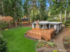 Single Mid-Century Modern design with incredible warm cozy spaces and an abundance of outdoor spaces.