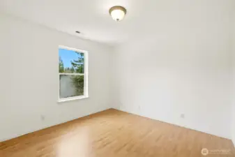 Bright, comfortable secondary bedroom that's perfect for guests, hobbies, or workspace. Convenient access to full hall bathroom.
