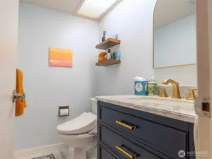 Lower level half bathroom