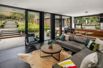 Wall of doors open to the stunning grounds