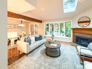 Living Room looking out to private patio through bay windows