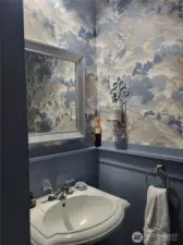 Half bath near front entrance.