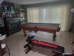 Family room with patio and gas fireplace.