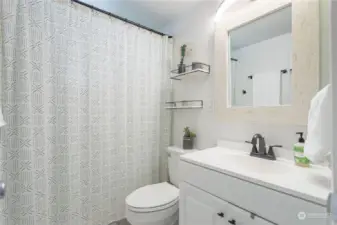 Full bathroom near living room