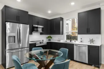 Sleek and stylish, the modern kitchen features black cabinets that give a contemporary edge to culinary spaces.