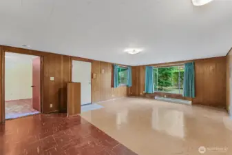 Ready for your personal touches! Living and eating area combination. Bedroom on the left.