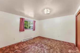 Roomy 1 bedroom overlooks the backyard.