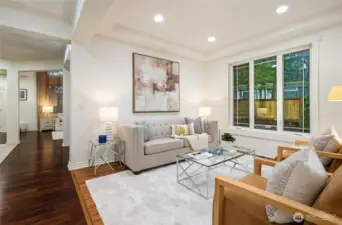 Open floor plan peeks into great room and kitchen beyond.